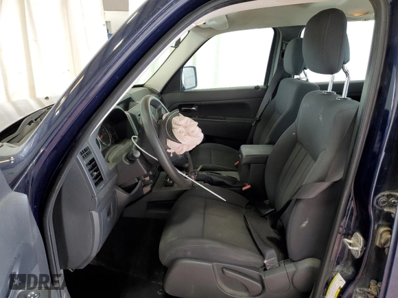 2012 Jeep Liberty Sport z VIN 1C4PJMAK9CW129035, wystawiony jako Copart lot #57905335 z przebiegiem 137 701 mil mil oraz Szkoda całkowita • Salvage title. Historia ofert i sprzedaży dostępna na DreamBid. Obrazek 7.