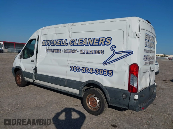 2015 Ford Transit Cargo with VIN 1FTNE2CM9FKA64133, listed as a IAAI auction lot 41312926 with 117,176 mi miles and . Bid and sale history available at carsss.com. Image 3.