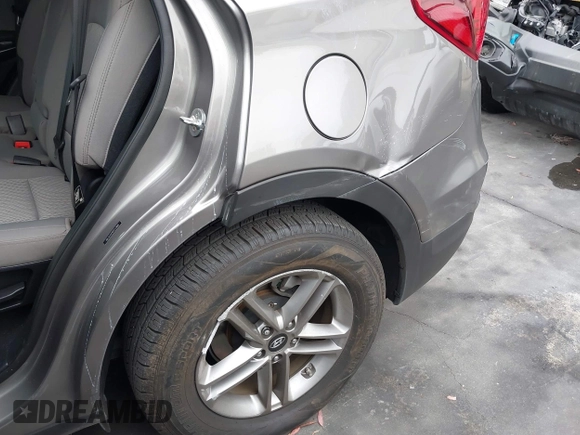 2018 Hyundai Santa Fe 2.4L with VIN 5NMZT3LB8JH076788, listed as a IAAI auction lot 42421969 with 49,689 mi miles and . Bid and sale history available at DreamBid. Image 6.