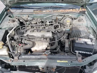 2000 Nissan Altima XE with VIN 1N4DL01D4YC102704, listed as a IAAI auction lot 41538425 with 228,639 mi miles. Bid and sale history available at carsss.com. Image 10.