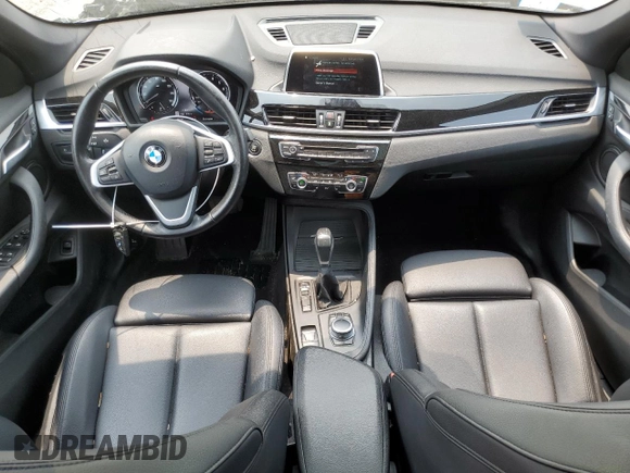2018 BMW X1 xDrive28i with VIN WBXHT3C36J3H29952, listed as a Copart auction lot 59679285 with 75,220 mi miles and Salvage title. Bid and sale history available at DreamBid. Image 8.