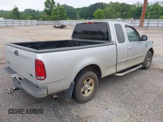 2000 Ford F-150 XL with VIN 1FTZX1725YNC17400, listed as a IAAI auction lot 42031955 with 1 mi miles. Bid and sale history available at carsss.com. Image 4.