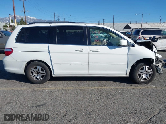 2006 Honda Odyssey EX z VIN 5FNRL38486B410286, wystawiony jako IAAI lot #41641433 z przebiegiem 145 312 mil mil oraz . Historia ofert i sprzedaży dostępna na DreamBid. Obrazek 13.