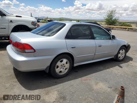 2002 Honda Accord EX z VIN 1HGCG16572A069123, wystawiony jako Copart lot #55861375 z przebiegiem 117 455 mil mil oraz Szkoda całkowita • Salvage title. Historia ofert i sprzedaży dostępna na DreamBid. Obrazek 3.