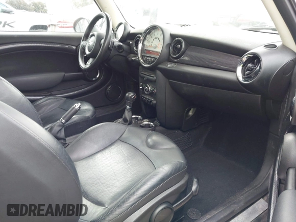 2013 MINI Hardtop S with VIN WMWSV3C55DT388301, listed as a IAAI auction lot 42058792 with 94,138 mi miles and . Bid and sale history available at DreamBid. Image 5.