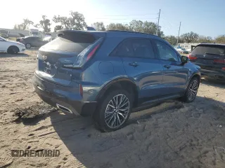 2024 Cadillac XT4 FWD Sport with VIN 1GYFZER40RF249101, listed as a Copart auction lot 76312304 with 1,969 mi miles and Salvage title. Bid and sale history available at DreamBid. Image 3.