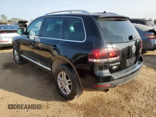 2010 Volkswagen Touareg VR6 with VIN WVGBF7A9XAD001790, listed as a Copart auction lot 70806534 with 90,103 mi miles and Salvage Title. Bid and sale history available at DreamBid. Image 2.