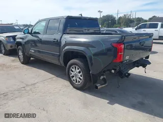 2024 Toyota Tacoma 4WD SR5 with VIN 3TMLB5JN5RM052698, listed as a IAAI auction lot 41427313 with 9,624 mi miles. Bid and sale history available at carsss.com. Image 3.