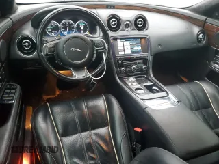 2013 Jaguar XJ with VIN SAJWA2G1XDLV55349, listed as a Copart auction lot 86587444 with 160,513 mi miles and Clean Title. Bid and sale history available at carsss.com. Image 8.