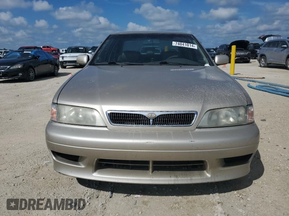 2002 Infiniti G20 Luxury z VIN JNKCP11A12T501940, wystawiony jako Copart lot #74041014 z przebiegiem Nie podano mil oraz Szkoda całkowita • Salvage title. Historia ofert i sprzedaży dostępna na DreamBid. Obrazek 5.