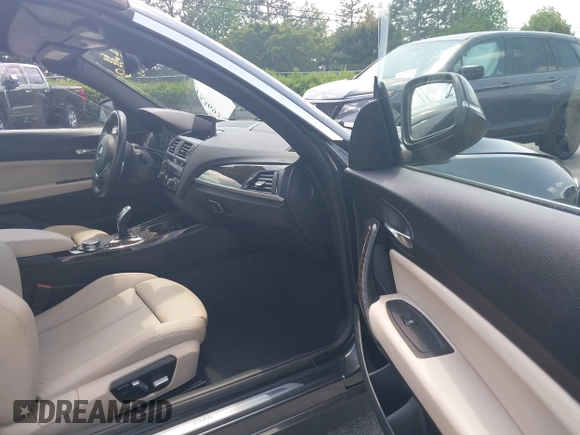 2016 BMW 2 Series 228i xDrive with VIN WBA1L9C50GV324910, listed as a IAAI auction lot 42153692 with 48,785 mi miles and . Bid and sale history available at DreamBid. Image 5.