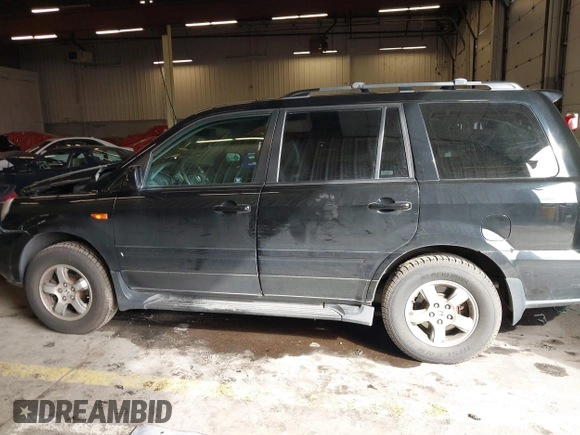 2007 Honda Pilot EX-L with VIN 2HKYF18647H504953, listed as a IAAI auction lot 41750435 with 186,097 mi miles and . Bid and sale history available at DreamBid. Image 14.