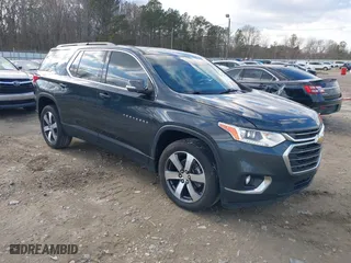 2021 Chevrolet Traverse LT Leather with VIN 1GNERHKW7MJ212137, listed as a IAAI auction lot 41420829 with 100,371 mi miles. Bid and sale history available at carsss.com. Image 1.