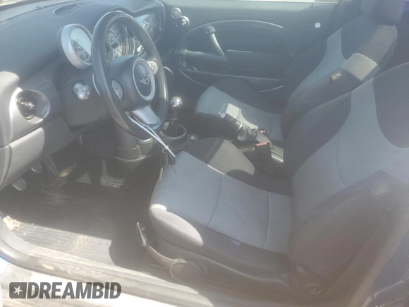 2005 MINI Hardtop S with VIN WMWRE33415TD90833, listed as a Copart auction lot 61238165 with 174,647 mi miles and Salvage title. Bid and sale history available at DreamBid. Image 7.