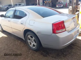 2010 Dodge Charger SXT with VIN 2B3CA3CV2AH180910, listed as a IAAI auction lot 42101292 with 177,028 mi miles and . Bid and sale history available at carsss.com. Image 3.