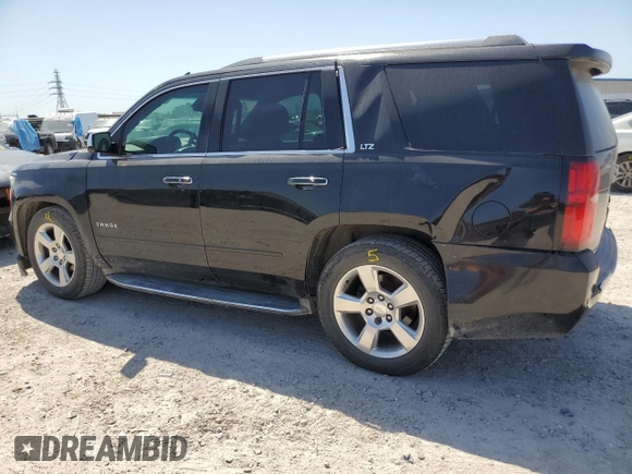 2015 Chevrolet Tahoe LTZ z VIN 1GNSCCKC7FR237119, wystawiony jako Copart lot #52712625 z przebiegiem 264 359 mil mil oraz Szkoda całkowita • Salvage title. Historia ofert i sprzedaży dostępna na DreamBid. Obrazek 2.