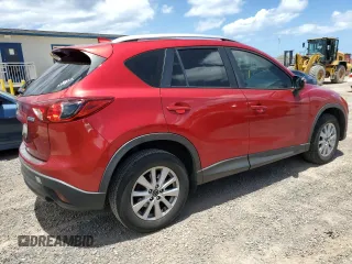 2016 Mazda CX-5 Sport с VIN JM3KE2BY4G0638102, выставлен на аукционе Copart как лот 56724445 с пробегом 189 235 миль миль и Списание • Salvage title. История ставок и продаж доступна на DreamBid. Изображение 3.