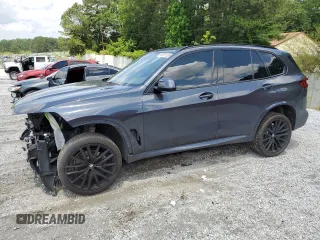 2020 BMW X5 sDrive40i with VIN 5UXCR4C04L9C93912, listed as a Copart auction lot 54501055 with 84,980 mi miles and Salvage title. Bid and sale history available at DreamBid. Image 1.