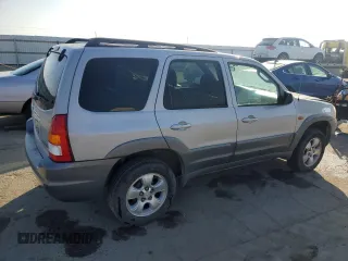 2002 Mazda Tribute LX with VIN 4F2YU09152KM50320, listed as a Copart auction lot 88131405 with 238,013 mi miles and Salvage Title. Bid and sale history available at carsss.com. Image 3.