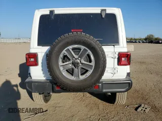 2020 Jeep Wrangler Unlimited Sahara Altitude with VIN 1C4HJXEG4LW314038, listed as a Copart auction lot 73728374 with 50,828 mi miles and Salvage title. Bid and sale history available at DreamBid. Image 6.