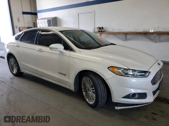2014 Ford Fusion SE Hybrid with VIN 3FA6P0LU7ER349951, listed as a Copart auction lot 48247925 with 197,441 mi miles and Salvage Title. Bid and sale history available at DreamBid. Image 4.