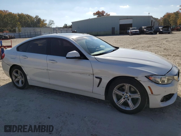 2015 BMW 4 Series 428i xDrive with VIN WBA4C9C53FG135040, listed as a Copart auction lot 74473923 with 102,271 mi miles and . Bid and sale history available at DreamBid. Image 4.