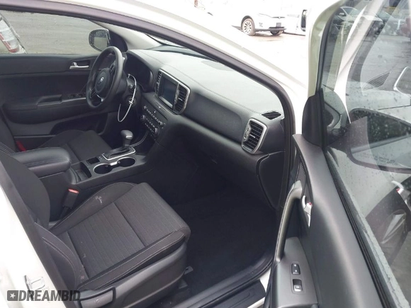 2019 Kia Sportage LX with VIN KNDPM3AC6K7508870, listed as a IAAI auction lot 41808770 with 104,141 mi miles. Bid and sale history available at carsss.com. Image 5.