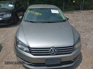 2014 Volkswagen Passat Wolfsburg Edition with VIN 1VWAT7A34EC097719, listed as a IAAI auction lot 42483880 with 255,655 mi miles and . Bid and sale history available at DreamBid. Image 6.