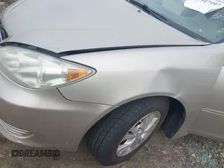2005 Toyota Camry LE with VIN 4T1BF32K05U093461, listed as a IAAI auction lot 41947197 with 127,630 mi miles and . Bid and sale history available at DreamBid. Image 13.