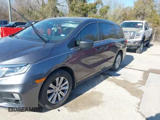 2018 Honda Odyssey LX with VIN 5FNRL6H2XJB041746, listed as a IAAI auction lot 41232936 with 119,509 mi miles. Bid and sale history available at carsss.com. Image 17.