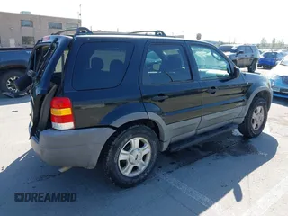 2002 Ford Escape XLT with VIN 1FMCU03142KC39723, listed as a IAAI auction lot 42228038 with 131,399 mi miles and . Bid and sale history available at DreamBid. Image 4.