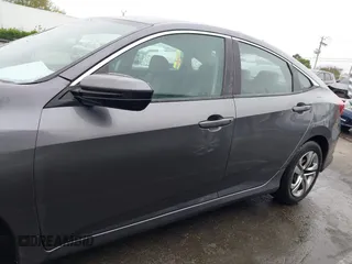 2017 Honda Civic LX z VIN 19XFC2F53HE023730, wystawiony jako IAAI lot #41885003 z przebiegiem 129 595 mil mil oraz . Historia ofert i sprzedaży dostępna na DreamBid. Obrazek 14.
