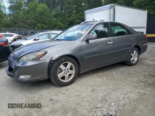 2002 Toyota Camry LE z VIN 4T1BE32KX2U574140, wystawiony jako Copart lot #57359985 z przebiegiem 315 854 mil mil oraz Szkoda całkowita • Salvage title. Historia ofert i sprzedaży dostępna na DreamBid. Obrazek 1.