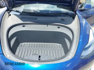 2021 Tesla Model 3 Standard Range Plus z VIN 5YJ3E1EAXMF098855, wystawiony jako IAAI lot #42226127 z przebiegiem 34 351 mil mil oraz . Historia ofert i sprzedaży dostępna na DreamBid. Obrazek 10.