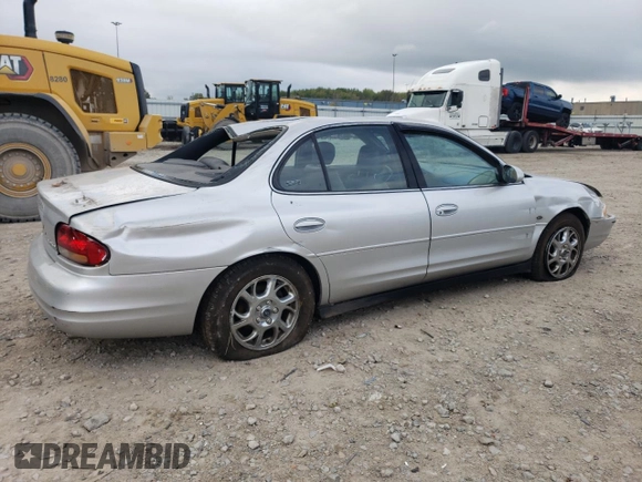 2000 Oldsmobile Intrigue GLS z VIN 1G3WX52H0YF233648, wystawiony jako Copart lot #72619824 z przebiegiem Nie podano mil oraz Nie do naprawy. Historia ofert i sprzedaży dostępna na DreamBid. Obrazek 3.