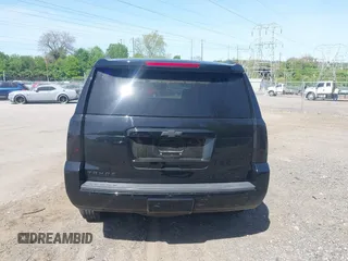 2020 Chevrolet Tahoe LT with VIN 1GNSKBKCXLR255963, listed as a IAAI auction lot 42127845 with 46,746 mi miles and . Bid and sale history available at DreamBid. Image 16.