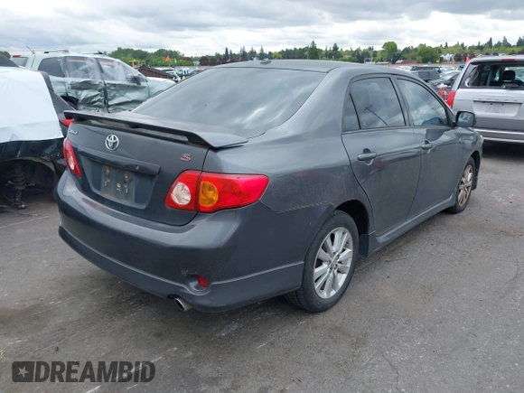 2009 Toyota Corolla with VIN 1NXBU40E39Z065572, listed as a IAAI auction lot 42138980 with 195,822 mi miles. Bid and sale history available at carsss.com. Image 4.