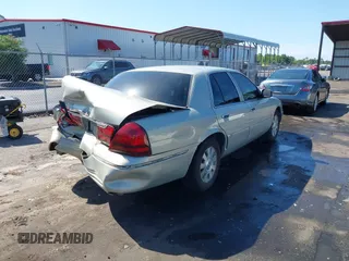 2004 Mercury Grand Marquis LS Premium z VIN 2MEHM75W64X681851, wystawiony jako IAAI lot #42389437 z przebiegiem 118 153 mil mil oraz . Historia ofert i sprzedaży dostępna na DreamBid. Obrazek 4.