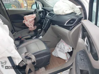 2016 Buick Encore Leather with VIN KL4CJGSB2GB724332, listed as a IAAI auction lot 41547091 with 61,096 mi miles. Bid and sale history available at carsss.com. Image 5.