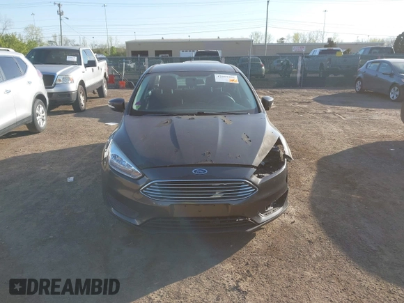 2016 Ford Focus SE with VIN 1FADP3F2XGL207906, listed as a IAAI auction lot 42099203 with 95,527 mi miles. Bid and sale history available at carsss.com. Image 12.