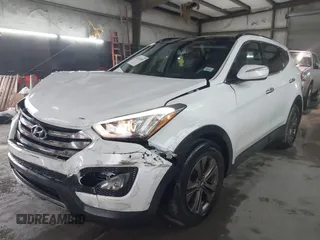 2014 Hyundai Santa Fe Sport with VIN 5XYZU3LB9EG140446, listed as a IAAI auction lot 41527693 with 129,610 mi miles. Bid and sale history available at carsss.com. Image 2.