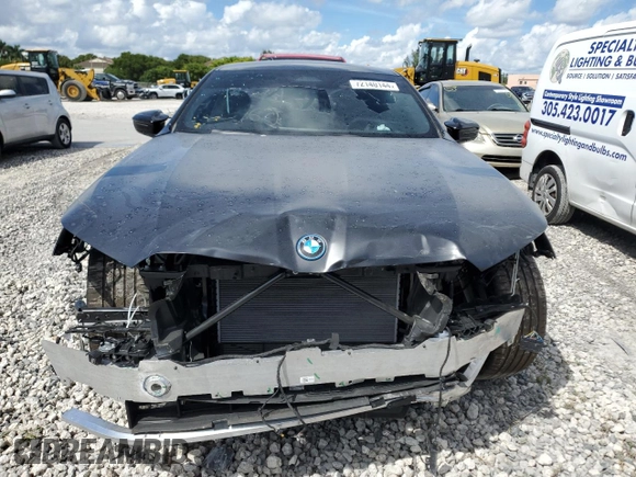 2024 BMW i5 M60 with VIN WBY43FK00RCR71826, listed as a Copart auction lot 72140144 with 5,987 mi miles and Salvage Title. Bid and sale history available at carsss.com. Image 5.