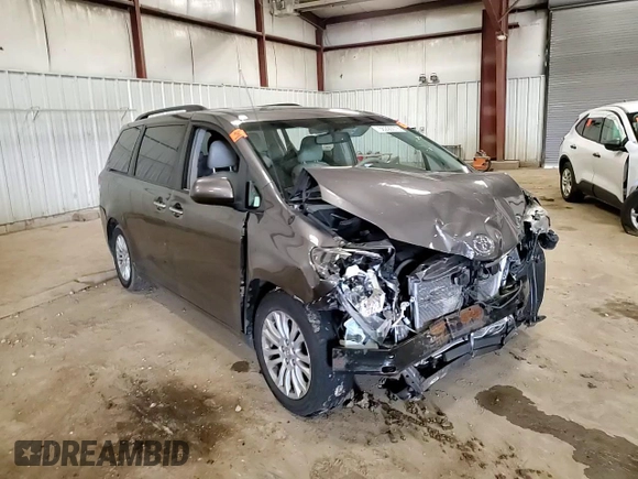 2014 Toyota Sienna XLE with VIN 5TDYK3DC0ES501557, listed as a Copart auction lot 56290015 with Not Provided miles and Clean Title. Bid and sale history available at DreamBid. Image 15.
