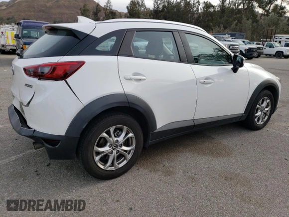 2016 Mazda CX-3 Touring with VIN JM1DKBC71G0123543, listed as a Copart auction lot 84657294 with 113,080 mi miles and Salvage Title. Bid and sale history available at carsss.com. Image 3.