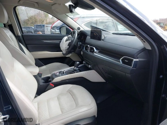 2021 Mazda CX-5 Grand Touring with VIN JM3KFADM1M1356538, listed as a IAAI auction lot 41723485 with 91,925 mi miles. Bid and sale history available at carsss.com. Image 5.