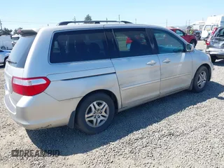 2006 Honda Odyssey EX-L with VIN 5FNRL38726B424923, listed as a IAAI auction lot 42099212 with 171,749 mi miles. Bid and sale history available at carsss.com. Image 4.