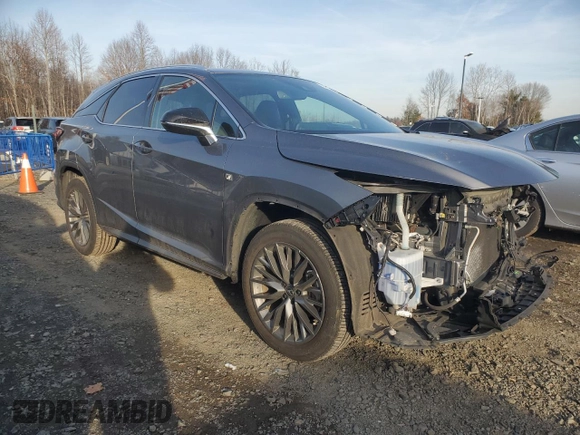 2022 Lexus RX 350 F Sport with VIN 2T2SZMDA3NC318017, listed as a Copart auction lot 86857654 with 54,131 mi miles and Salvage title. Bid and sale history available at DreamBid. Image 4.
