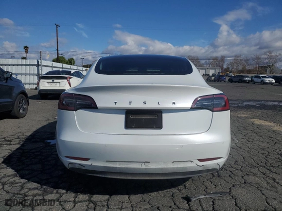 2019 Tesla Model 3 Mid Range with VIN 5YJ3E1EA5KF485617, listed as a Copart auction lot 42179575 with 101,257 mi miles and Salvage Title. Bid and sale history available at carsss.com. Image 6.