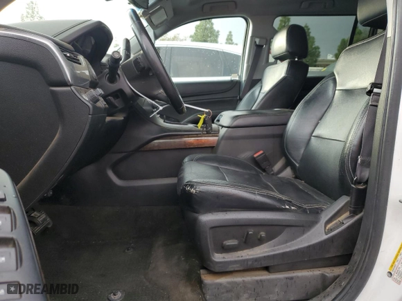 2015 Chevrolet Suburban LS with VIN 1GNSCHKC9FR667540, listed as a Copart auction lot 80908574 with 125,428 mi miles and Salvage Title. Bid and sale history available at carsss.com. Image 7.