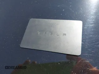2019 Tesla Model 3 Long Range with VIN 5YJ3E1EB9KF231742, listed as a IAAI auction lot 42114608 with 86,657 mi miles and . Bid and sale history available at DreamBid. Image 11.